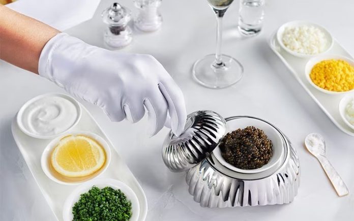 imgi_43_first-class-dining-caviar-glove-champagne-w768x480